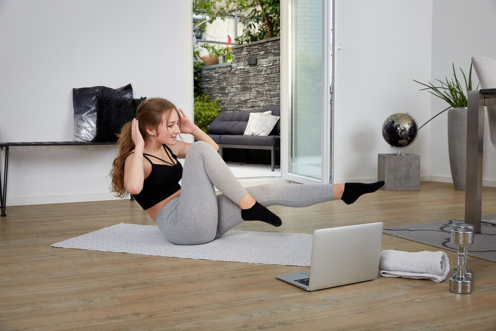 Woman exercising at home