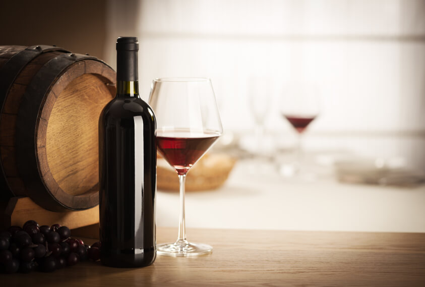 wine setting with barrel and grapes