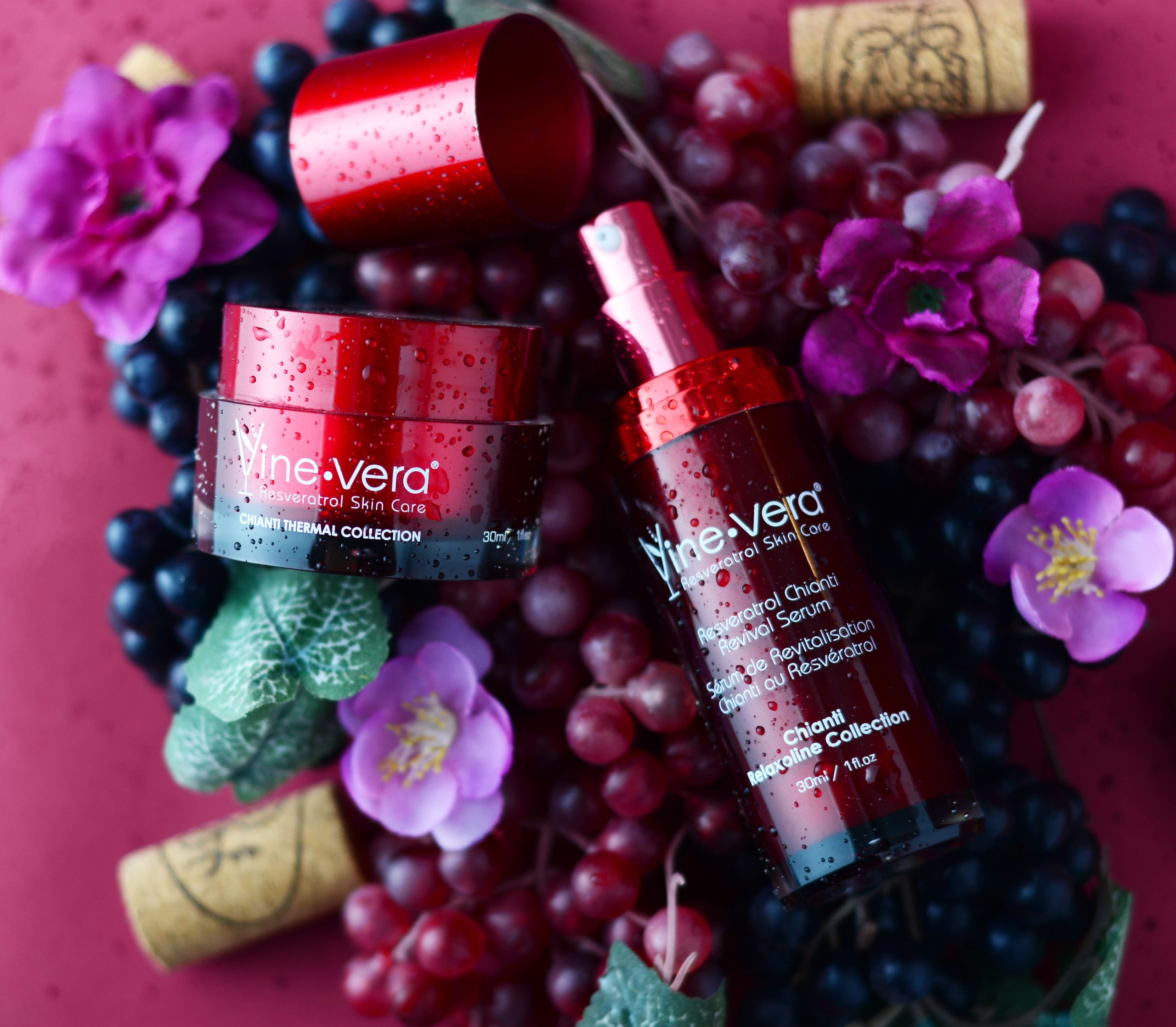 Vine Vera resveratrol skincare products with red grapes and flowers