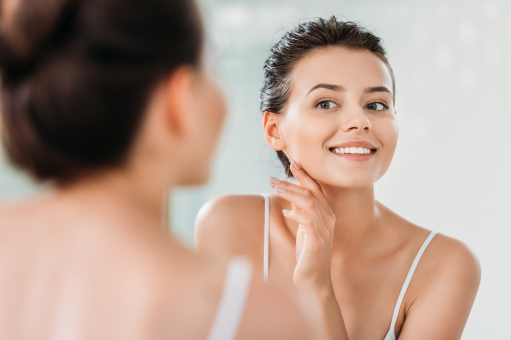 Woman showing face after exfoliation