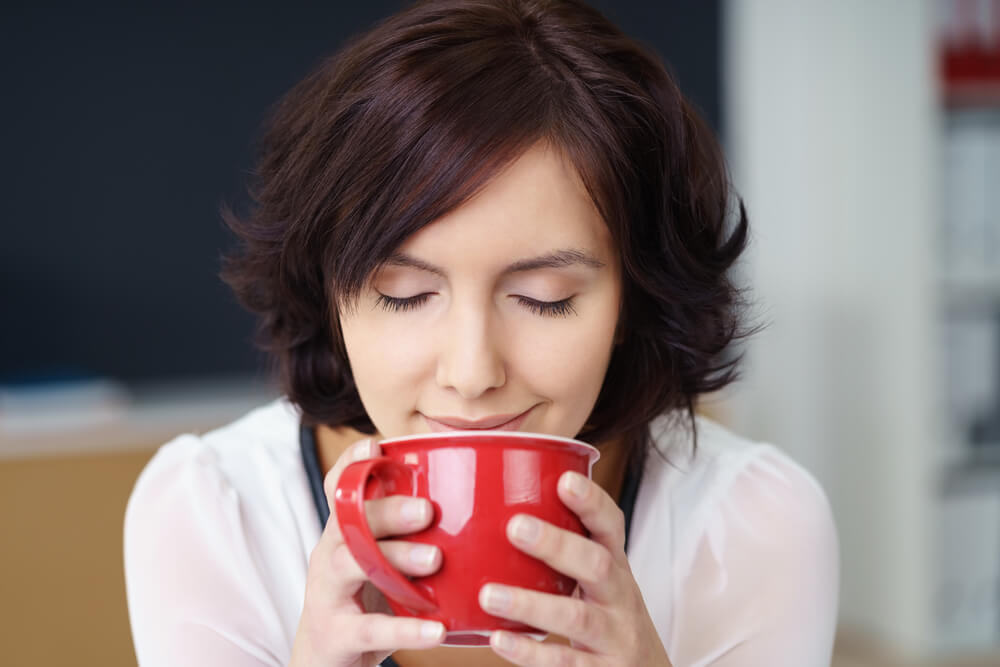 Woman enjoying a cup of coffee