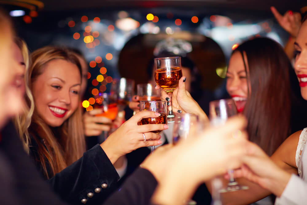 woman celebrating with wine