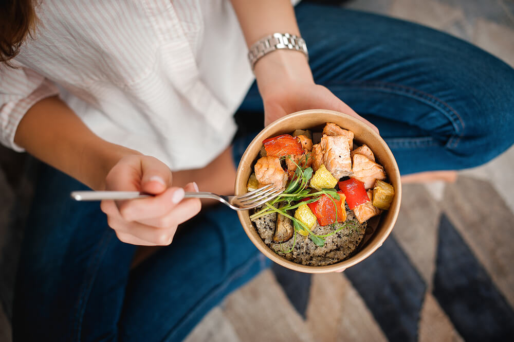 Woman eating healthy to reduce the appearance of aging