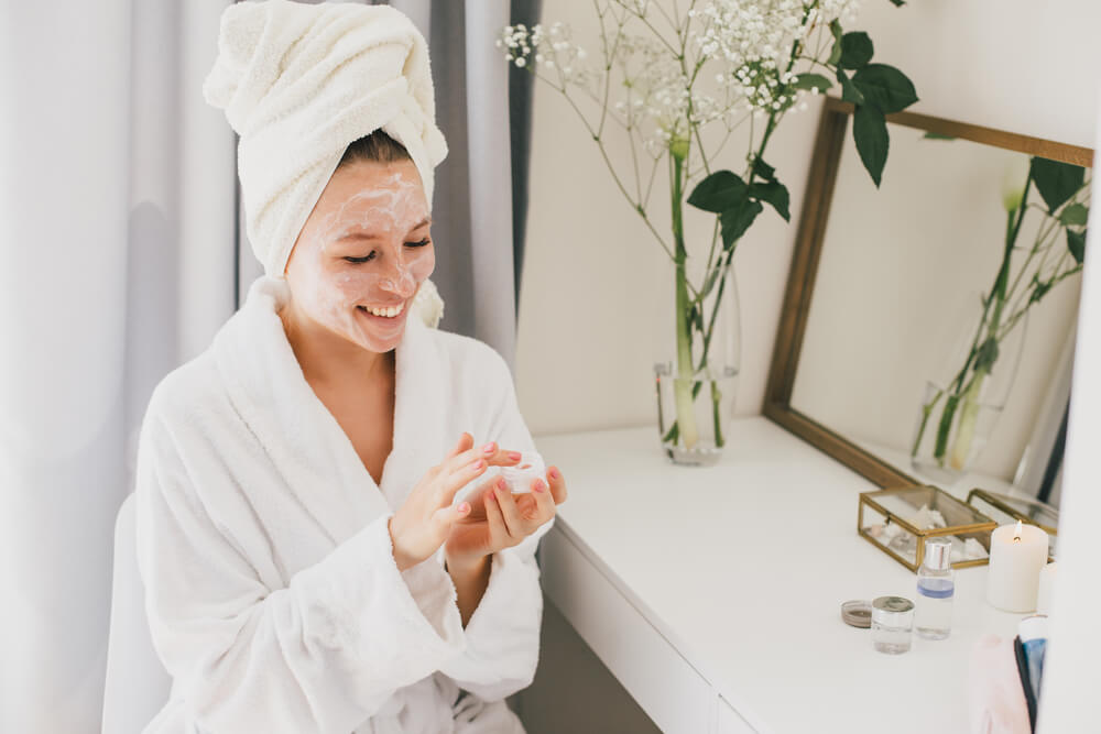 Woman using skin care for spring