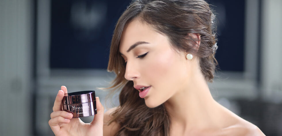 Gal Gadot holding Vine Vera product