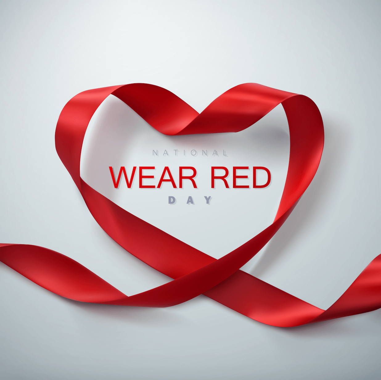 Creative ribbon framing 'Wear Red' sign