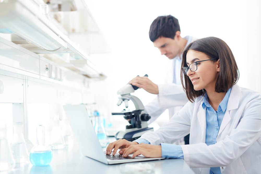 Scientists conducting research in the lab