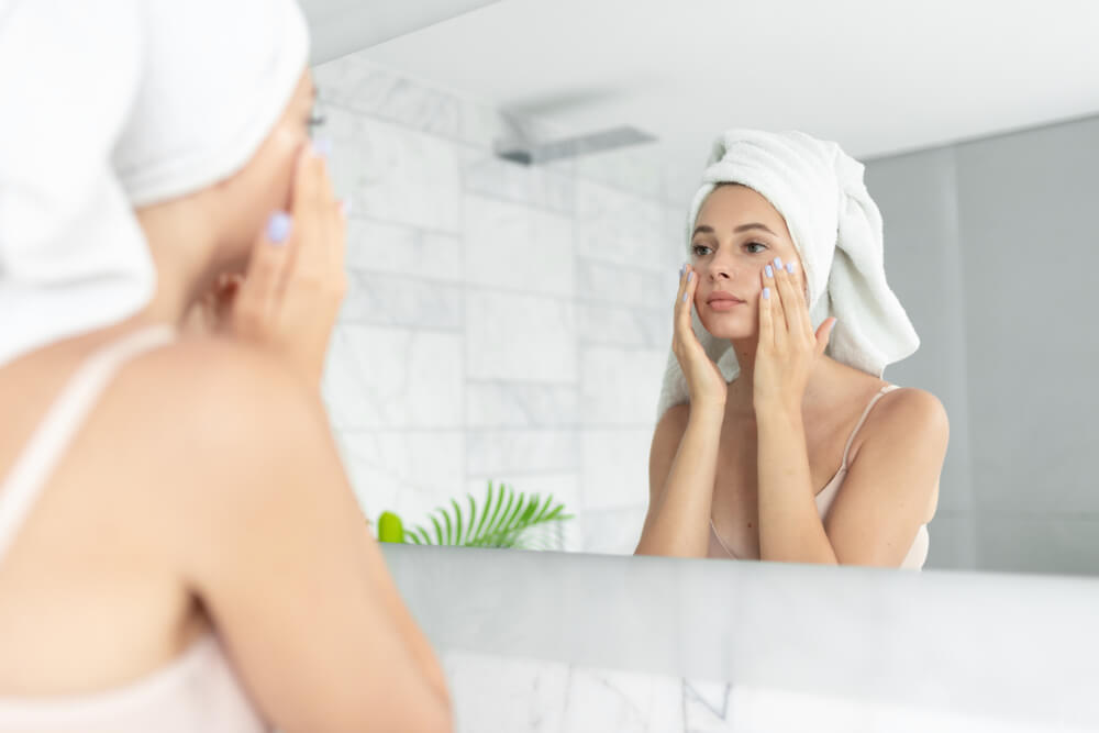 girl looking in mirror